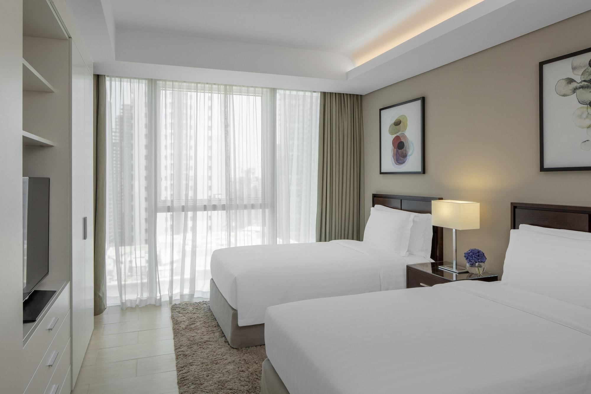 Dusit Doha Hotel Exterior photo Deluxe Room