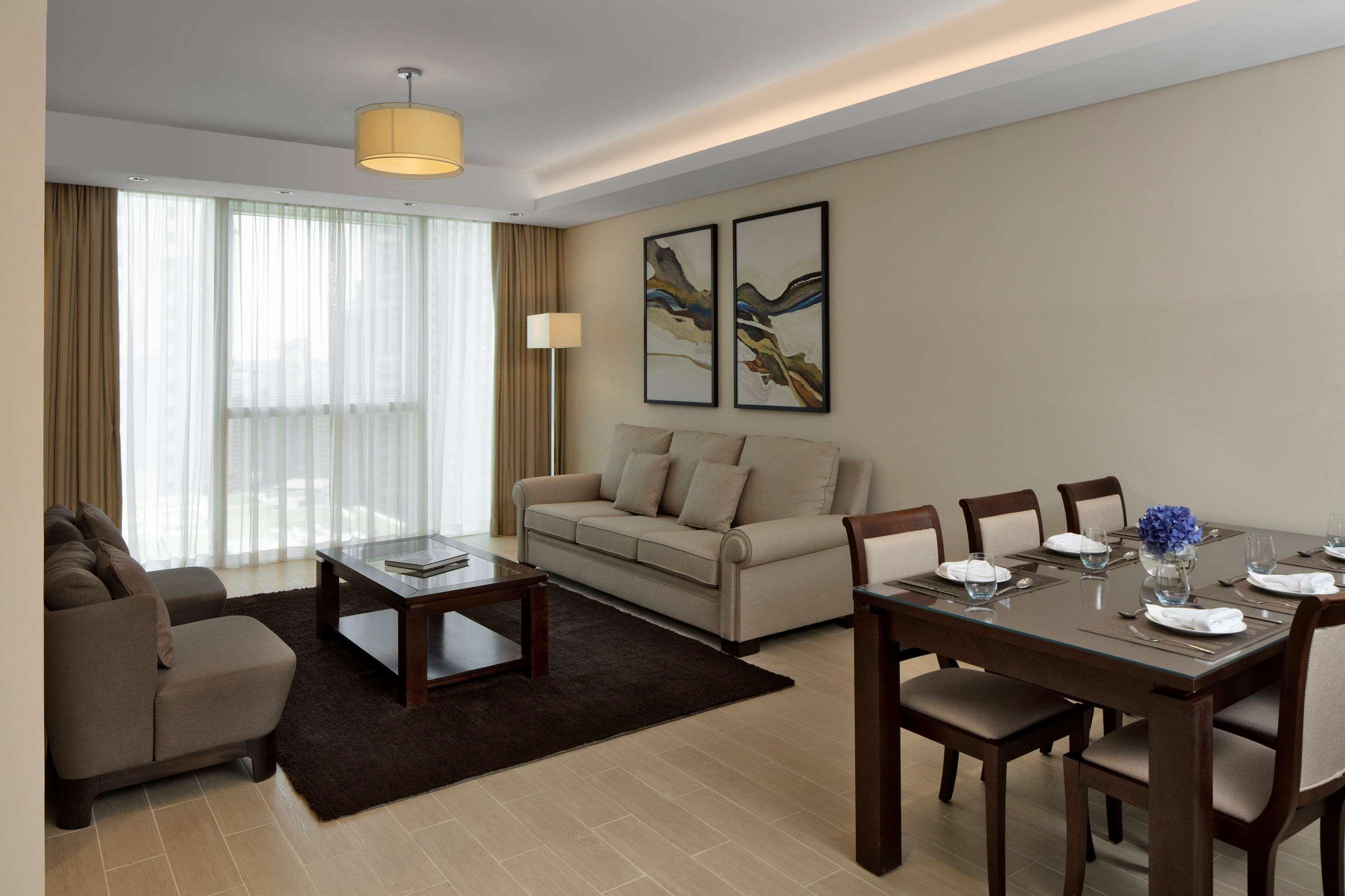 Dusit Doha Hotel Exterior photo A living room