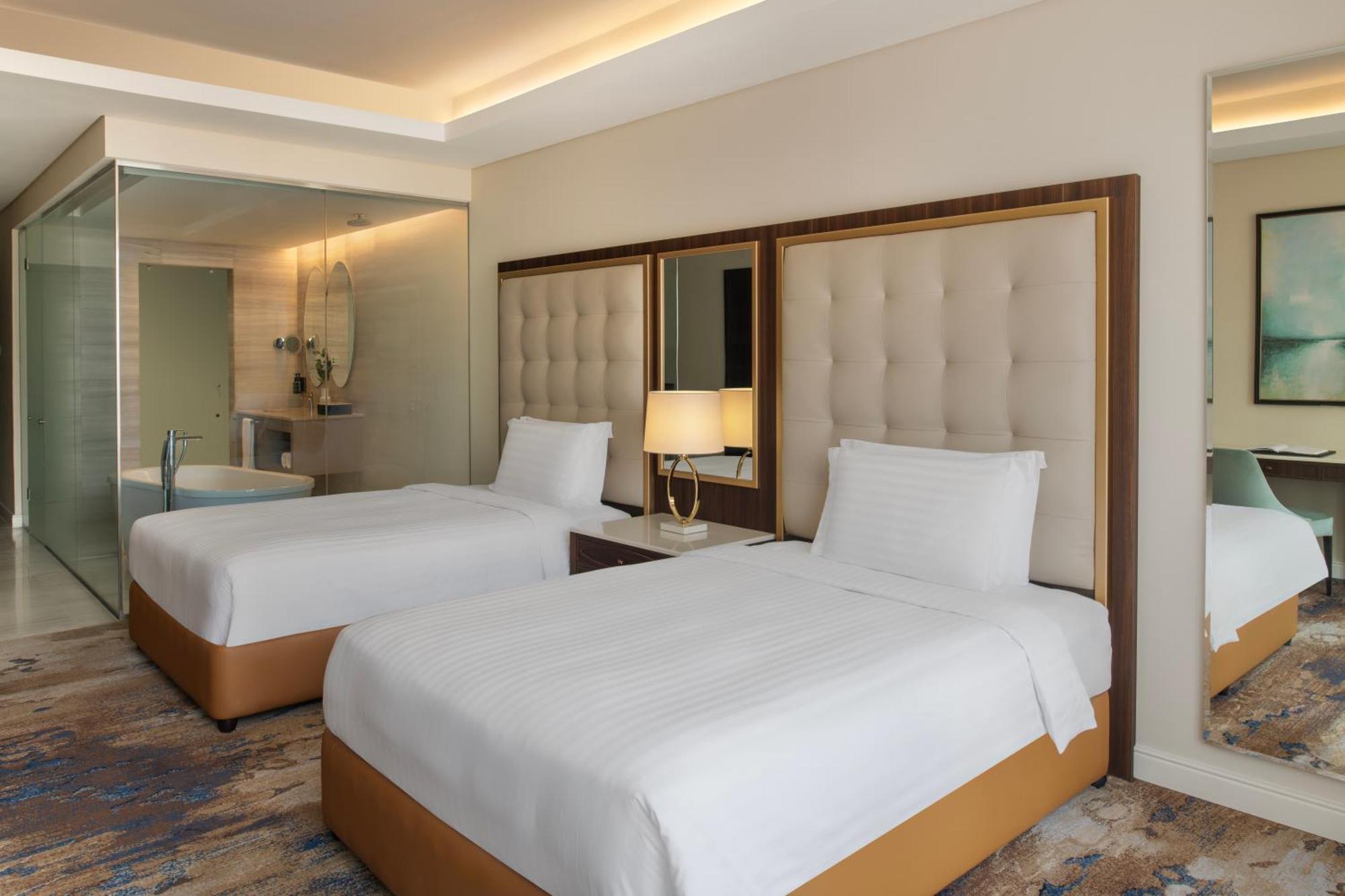 Dusit Doha Hotel Exterior photo Deluxe Room