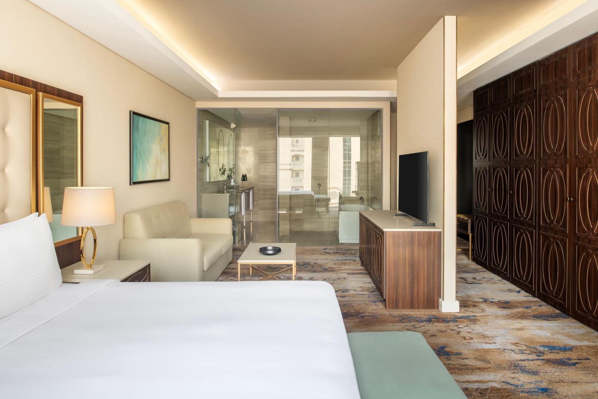 Dusit Doha Hotel Exterior photo A guest room at the hotel