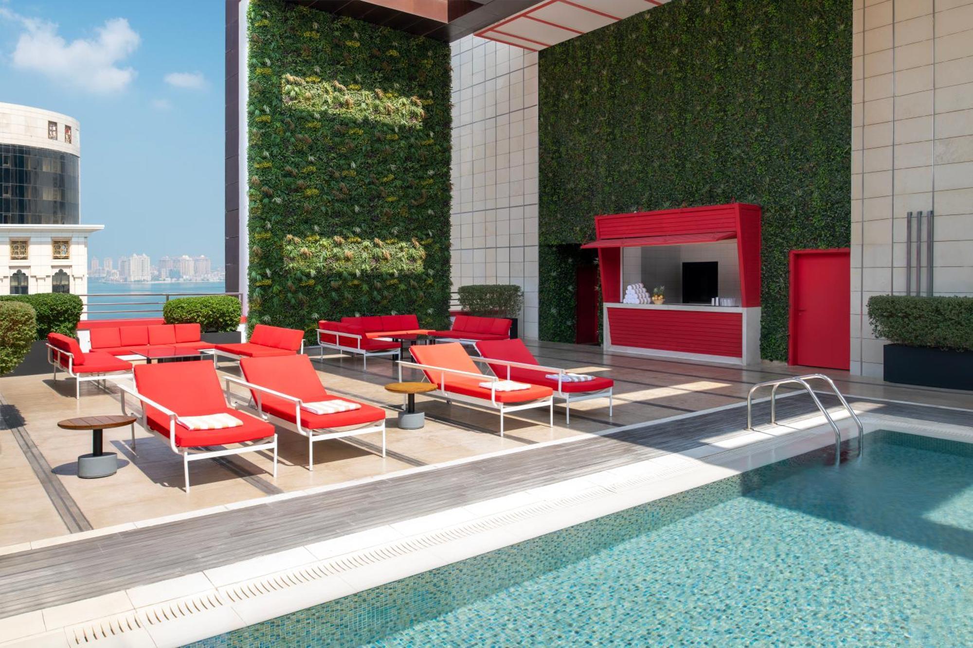 Dusit Doha Hotel Exterior photo The rooftop pool at The Hari